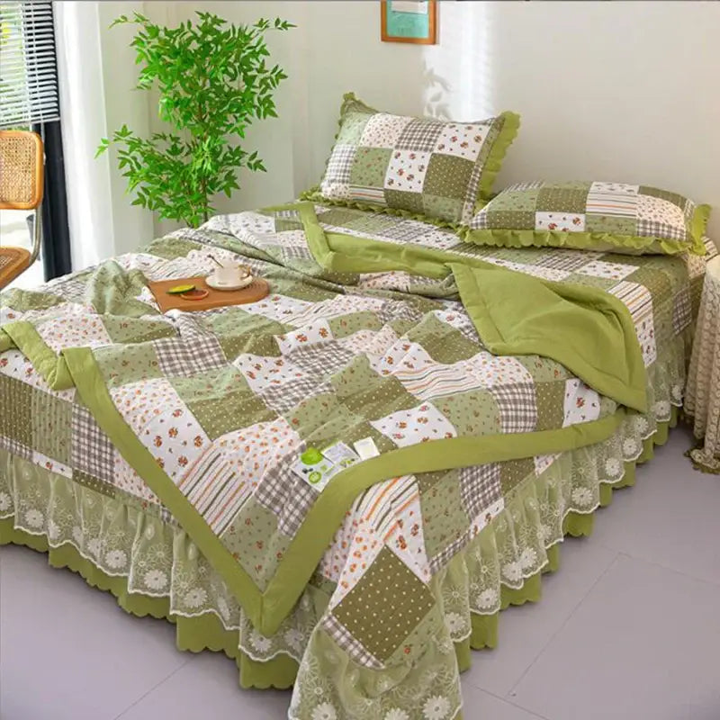 Green patchwork cotton summer bedding cover set with floral and checkered patterns and lace trim by DecorBites