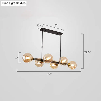 DecorBites™ black metal pendant light with five amber glass globe bulbs features stylish postmodern design