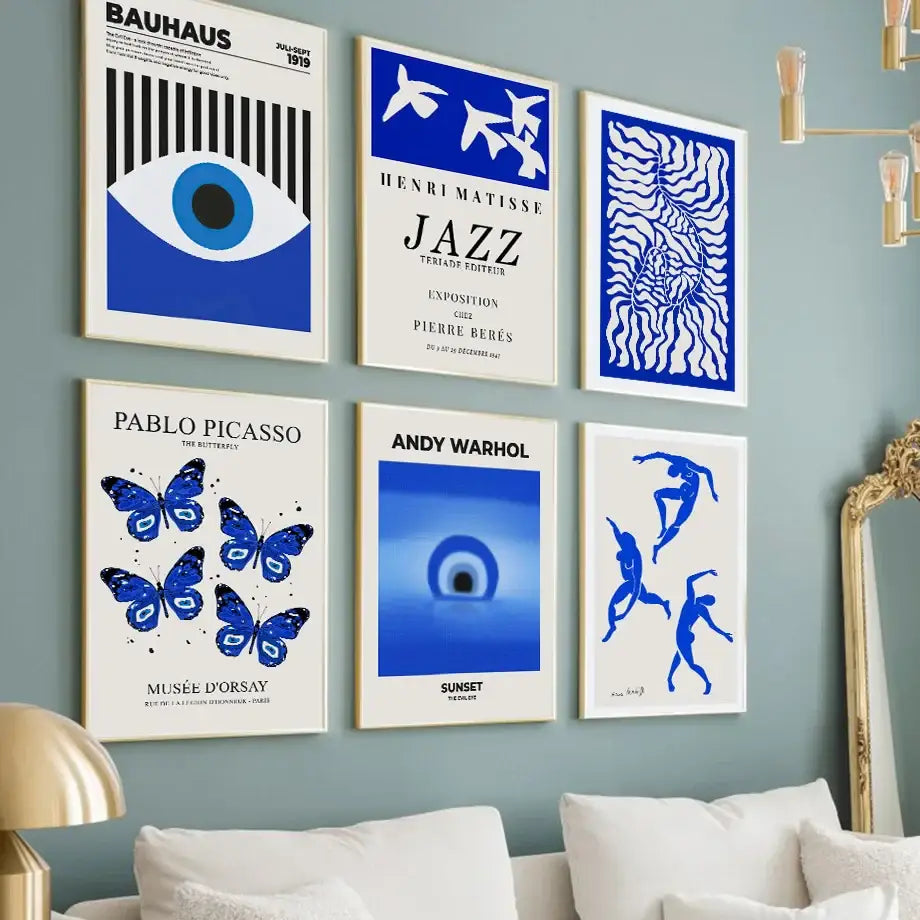 Six framed blue and white bold art prints including bauhaus and matisse in a butterfly botanical canvas for living room decor