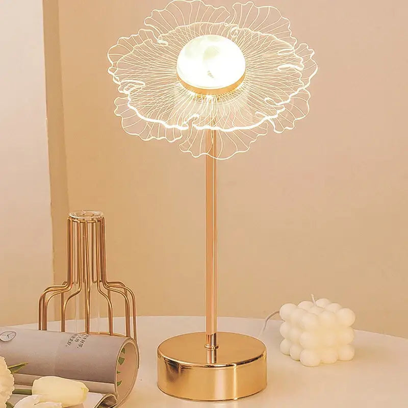 Gold-toned decorbites butterfly gold acrylic led desk lamp with flower-shaped wireframe and illuminated center for living room