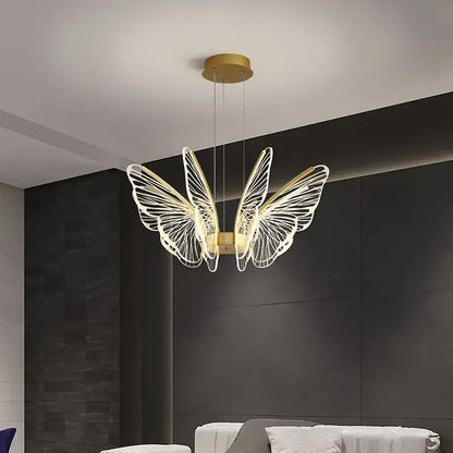 Gold-toned decorbites butterfly led chandelier pendant light with delicate wireframe wings for bedroom decor