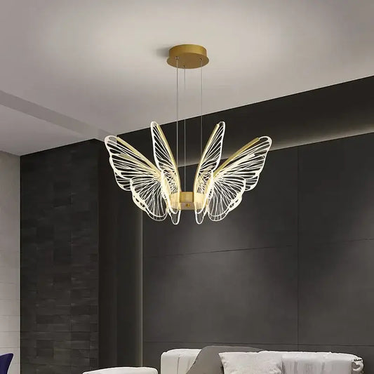 Gold-toned decorbites butterfly led chandelier pendant light with delicate wireframe wings for bedroom decor