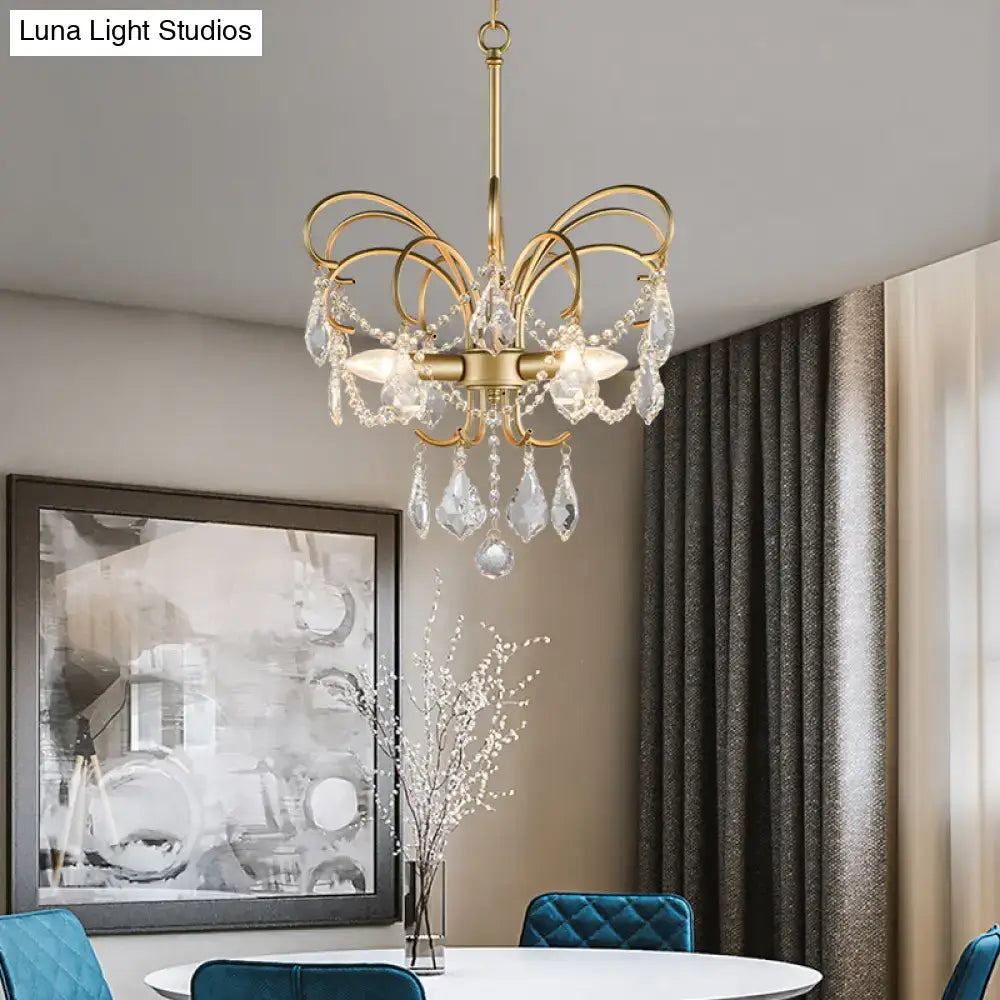 Gold-toned decorbites butterfly shaped chandelier with curved metal arms and crystal droplets 15 inch fixture for living room