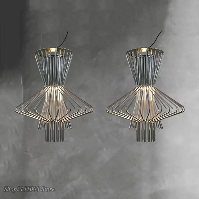 Modern chrome wireframe decorbites cage industrial pendant lights with geometric tiered design and warm illumination for kitchen