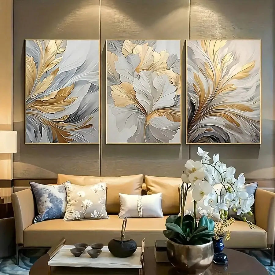 DecorBites™ canvas wall art set featuring three-panel abstract floral prints with gold silver and gray leaf motifs in a modern frame