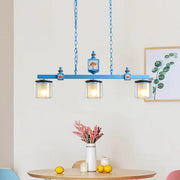 DecorBites™ cartoon 3 bulbs island pendant light in blue metal with sky water glass shades and shell motifs