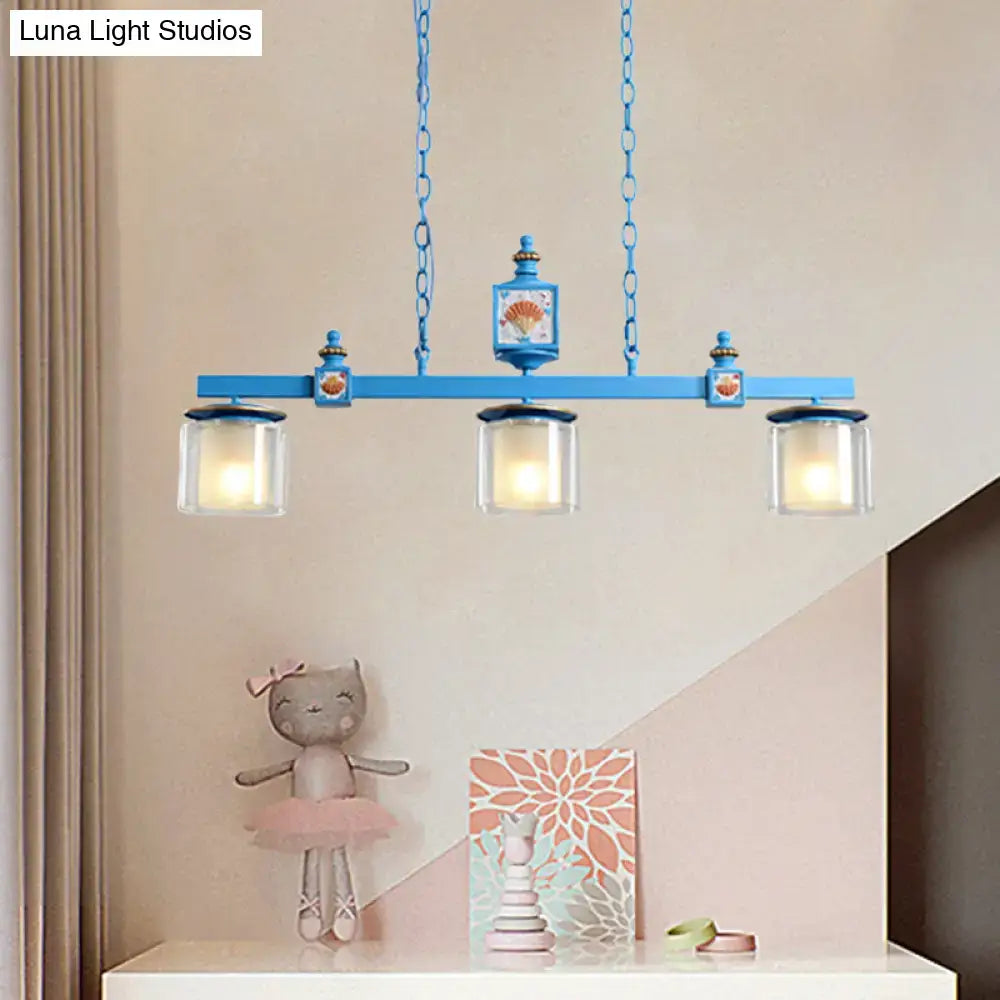 Blue metal chandelier with three sky water blue glass shades and decorative shell motifs from decorbites cartoon series