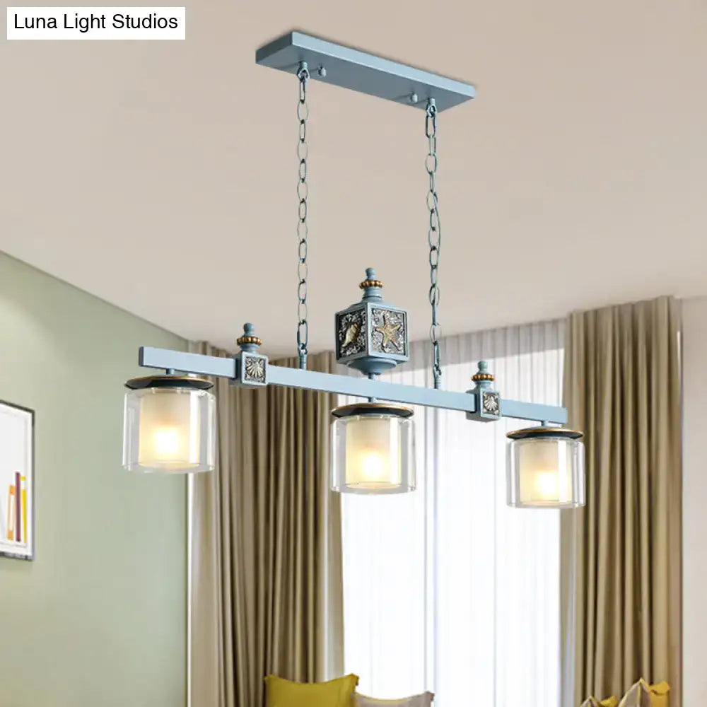 Decorbites sky water blue metal chandelier with three glass shades and ornate central decorative element