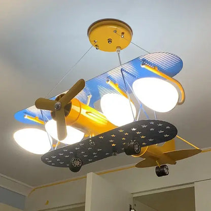 Yellow and blue decorbites cartoon aircraft fan light with star-patterned wings for bedroom ceiling lighting