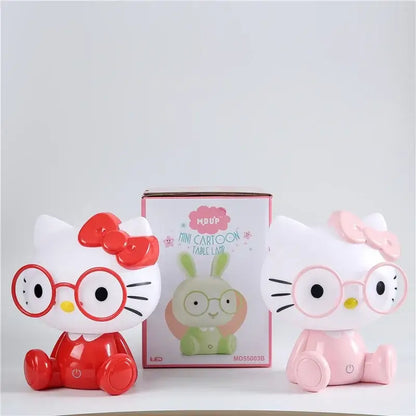 Two decorbites cartoon animal led night lamps in red and pink featuring hello kitty with glasses and bows