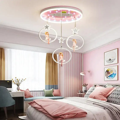 Pink circular ceiling light with glowing led and three hanging rings featuring cartoon fairies decorbites cartoon princess chandelier