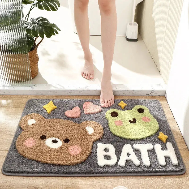 Gray decorbites cartoon puppy flocked bath mat with embroidered brown bear green frog faces pink hearts and yellow stars