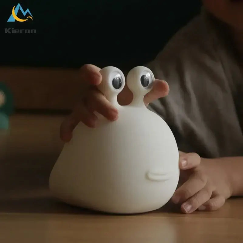 White soft silicone decorbites cartoon slug night light with oversized googly eyes and tiny mouth for bedroom use