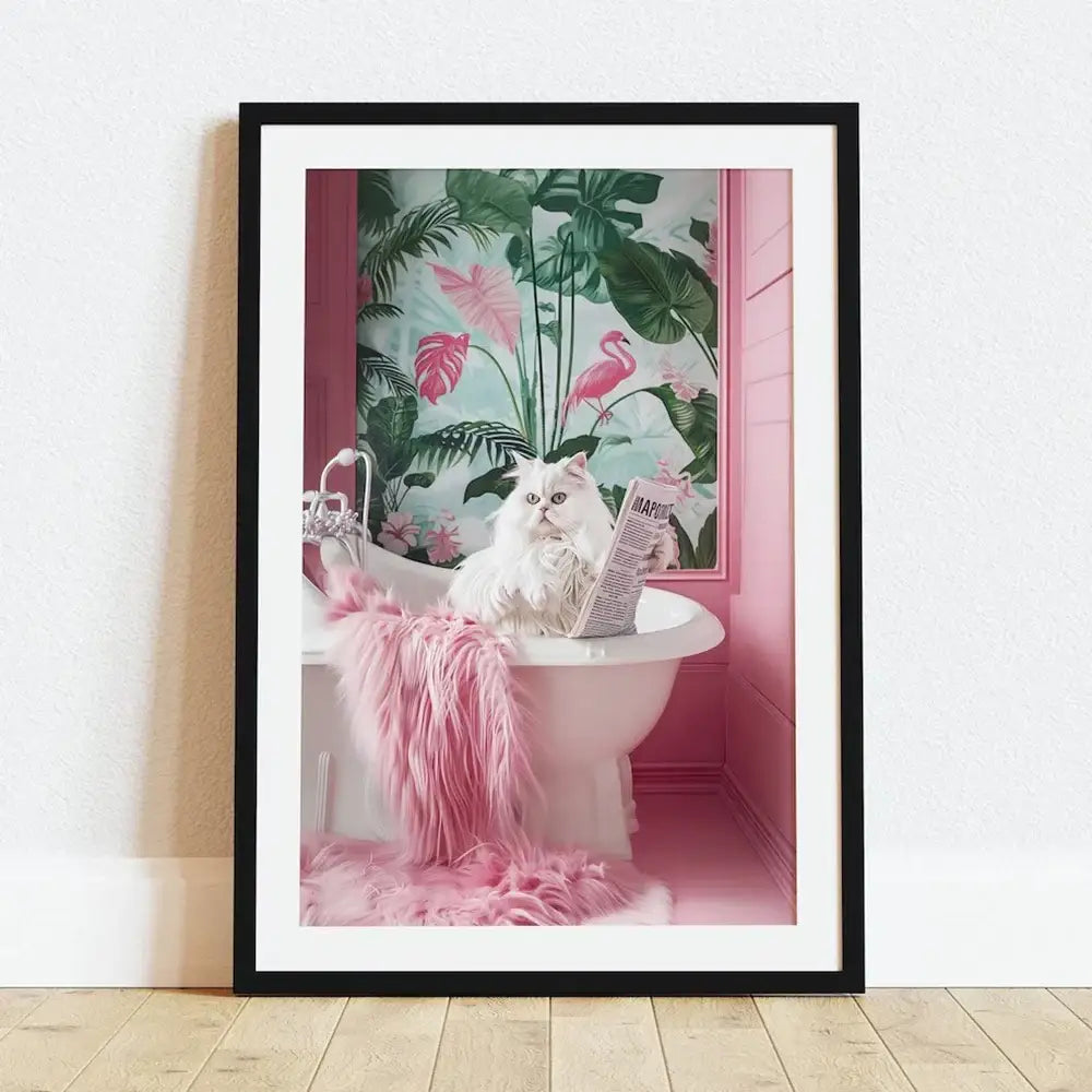 A framed canvas wall art of a fluffy white cat in a pink bathtub with tropical foliage, perfect for cat reading decor