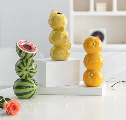 DecorBites ceramic fruit vase set with three stacked ceramic vases in vibrant green yellow and orange for home and office