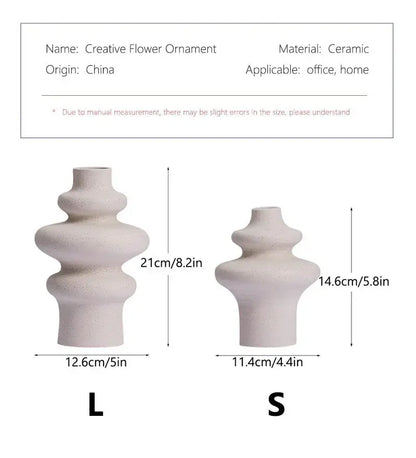 Cream-colored ceramic vases with tiered sculptural design from decorbites for modern home decor and caprion ceramic vases