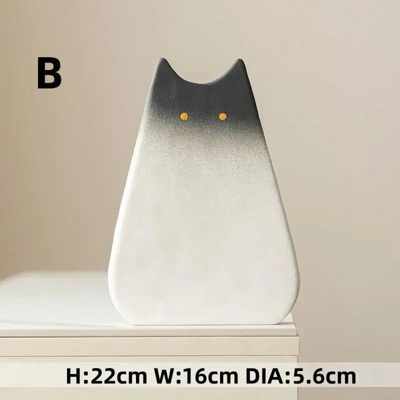 DecorBites charming cat-inspired ceramic vase with gradient black-to-white finish and glossy orange eyes for living room