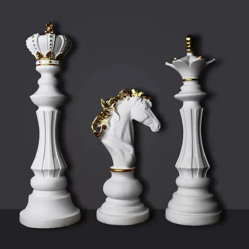White chess pieces figurines with gold accents including king queen and knight by DecorBites chess for home decor