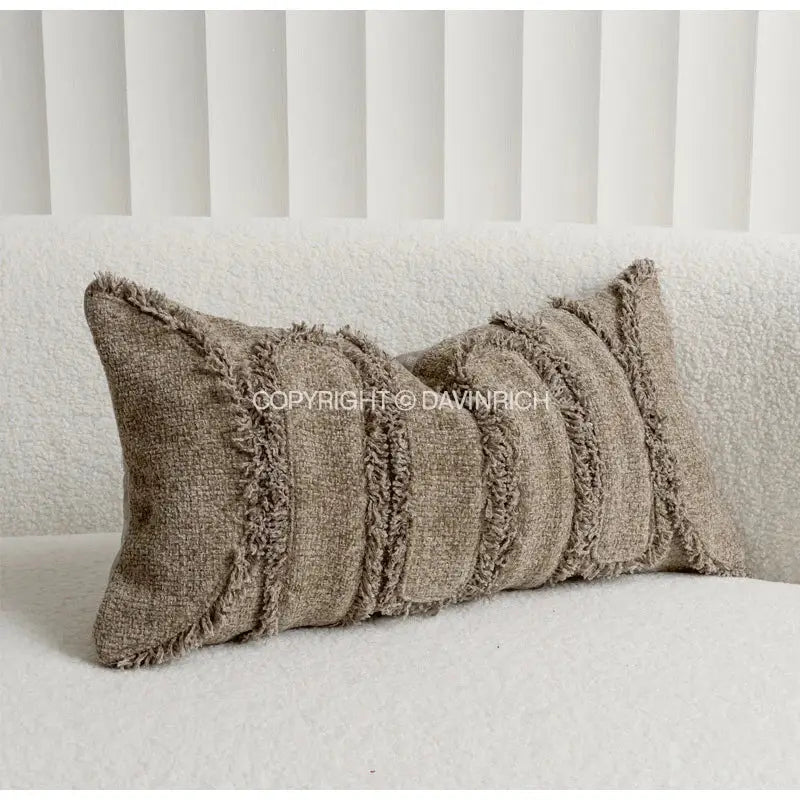 Beige textured decorbites chestnut brown wabi lumbar pillow case with frayed edges and vertical stitched panels