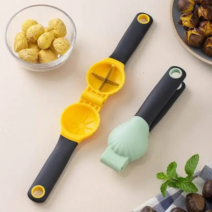 Yellow and black plastic nut cracker with cross shaped cutting mechanism in decorbites chestnut machine nut cracker set