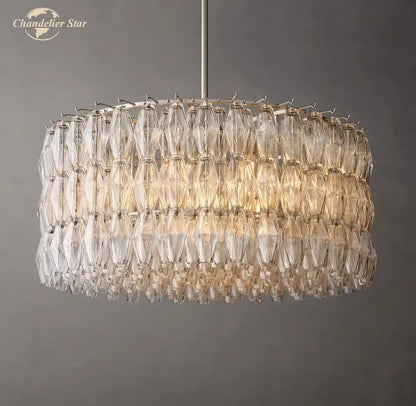 A tiered DecorBites Chiara clear glass modern black chandelier with faceted crystals for living room lighting