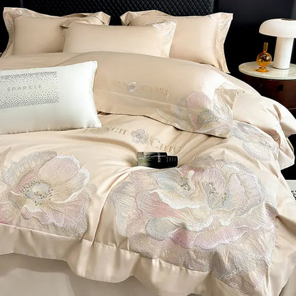 Beige satin duvet cover with delicate pink and silver floral embroidery from decorbites chic embroidered cotton bedding set