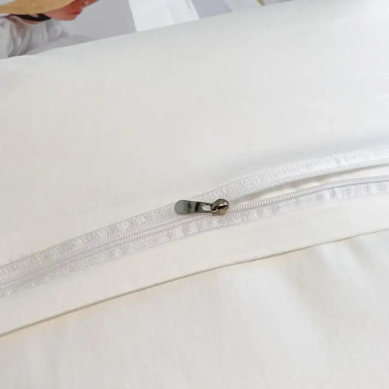 White fabric pillowcase with silver zipper edge from decorbites chic flowers embroidery bedding set in 100% egyptian cotton
