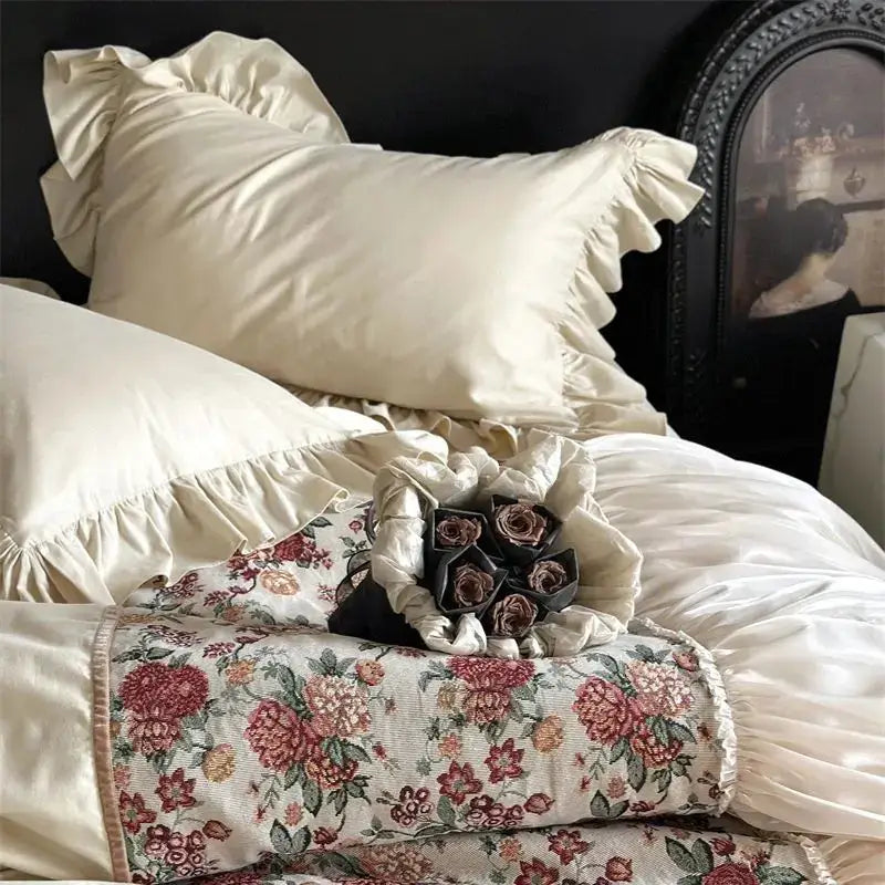 Cream-colored ruffled pillow with satin-like finish from decorbites chic flowers jacquard cotton bedding set