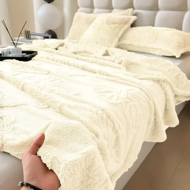 Cream-colored decorbites chiffon butterfly throw blanket with soft textured surface and subtle embroidered leaf patterns