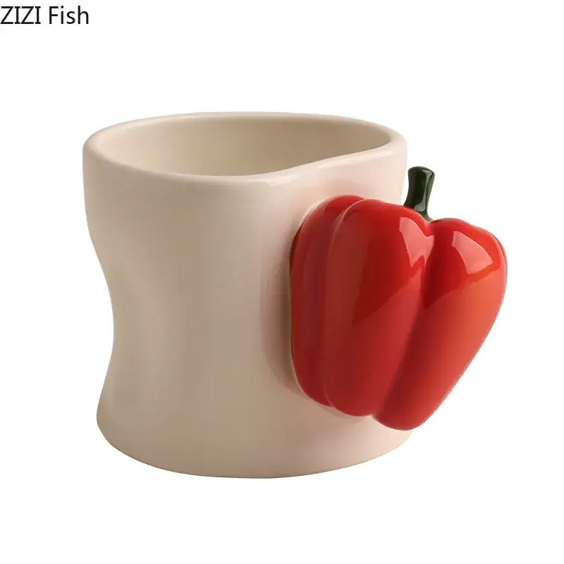 Cream-colored porcelain decorbites chili handle cup with glossy red bell pepper handle and green stem for coffee or tea