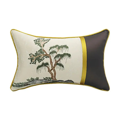 Cream-colored DecorBites pillow cover with chinoiserie landscape embroidered tree design and gold trim accents
