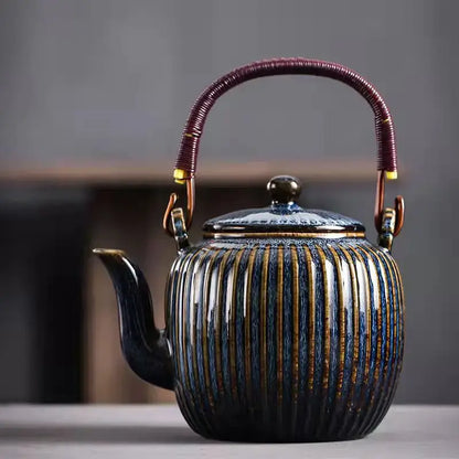 Decorbites™ chinese ceramic teapot set with glossy dark blue glaze, gold stripes, woven purple handle, and brass accents