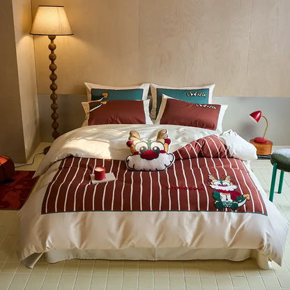 Red and white striped king size duvet cover with embroidered cartoon reindeer design in cotton bedding set by DecorBites