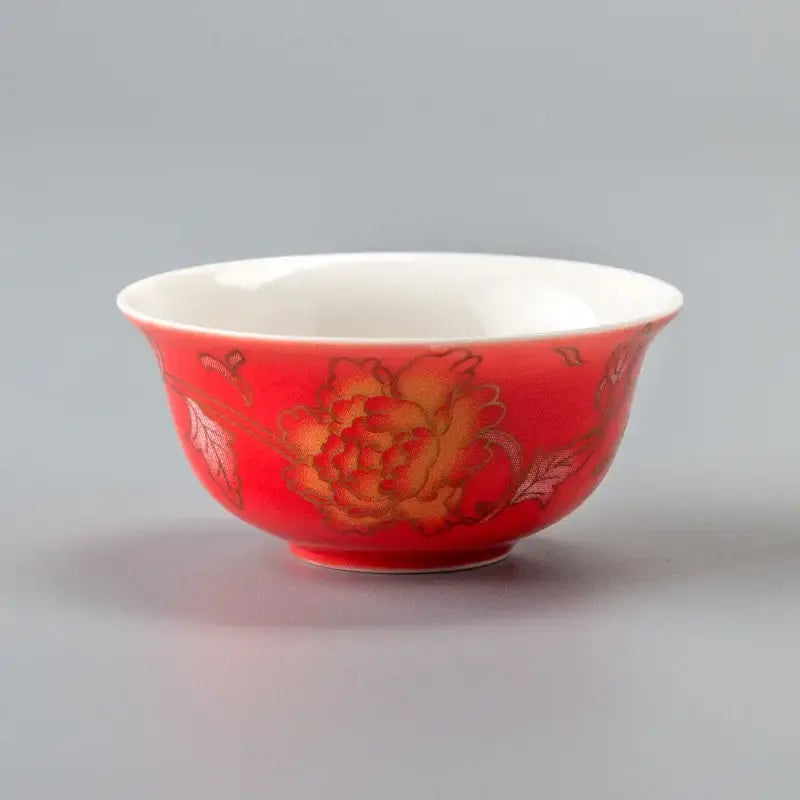 DecorBites™ vibrant red porcelain tea cup with golden dragon tea design and intricate golden peony patterns