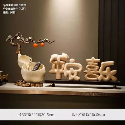 Beige ceramic decorbites™ chinese gourd desktop storage decoration with tree branch, birds, oranges, and sculpted chinese characters on dark base