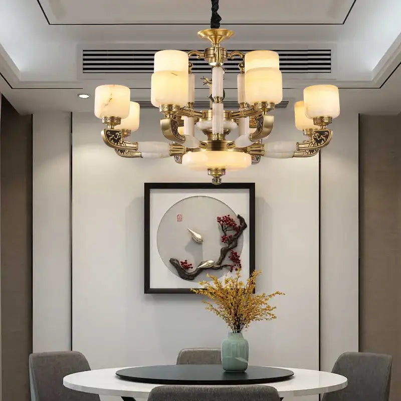 Gold-toned DecorBites jade chandelier with frosted glass shades and white marble accents for modern living spaces