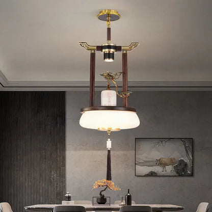 Decorbites chinese lantern chandelier with dark wood, brass accents, and ornate dragon on white marble base for living room