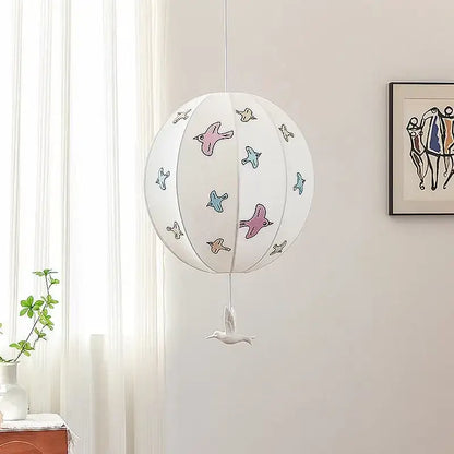 White spherical pendant light with pastel bird illustrations and ceramic bird ornament decorbites chinese medieval dove design