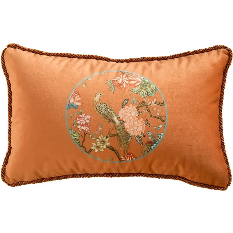 Orchid velvet pillow cover with circular embroidered bird and blossom design framed by braided brown trim, decorbites chinese peony flower