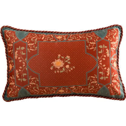 Rectangular pillow cover with rust fabric featuring decorbites chinese peony flower print and braided red trim