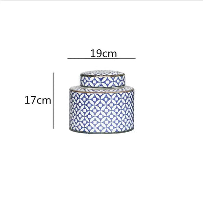 A cylindrical ceramic jar with a lid in blue and white geometric decorbites chinese retro ceramics golden design for home décor