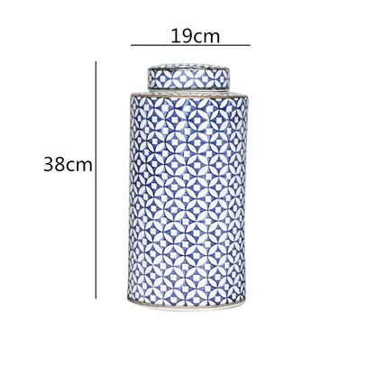 A tall porcelain tea canister with lid featuring blue and white geometric pattern in decorbites chinese retro ceramics golden style