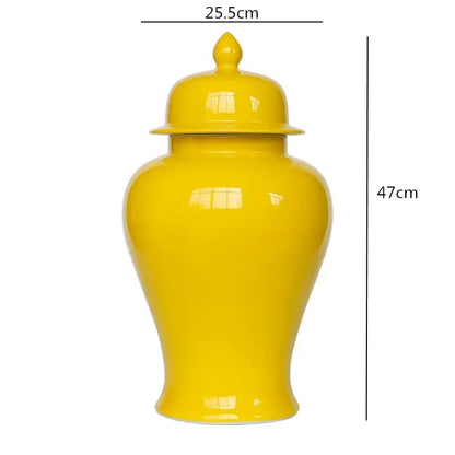 Bright yellow ceramic general jar vase with matching lid and tapered base for home decor and storage by decorbites