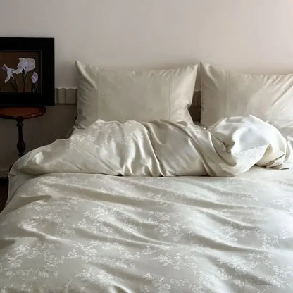 Cream-colored satin duvet cover set with delicate white floral embroidery from decorbites chinese style jacquard collection