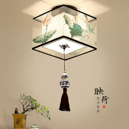 Decorbites chinese style ceiling lamp with translucent fabric shade hand-painted lotus motifs and blue porcelain accents