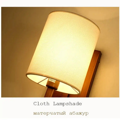 Cream-colored DecorBites™ Chinese style cloth wall lamp with woven texture and wooden bracket for bedroom and corridor
