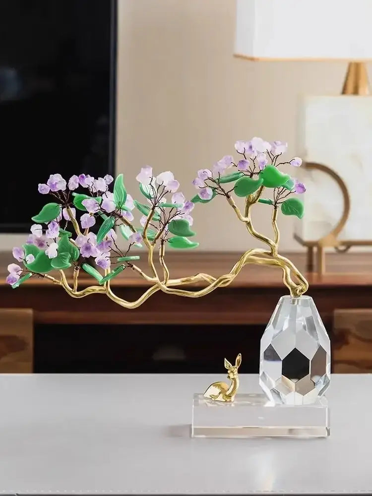 A delicate gold-toned bonsai tree sculpture with purple green jade blossoms on a crystal base by decorbites chinese style crystal ornaments