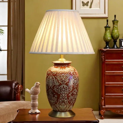 DecorBites™ vintage red ceramic table lamp with ornate red and gold pattern and pleated off-white fabric shade for bedroom