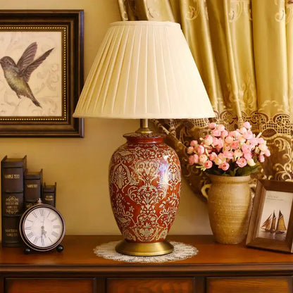 Decorbites™ chinese style vintage red ceramic table lamp with intricate gold damask patterns and cream pleated shade