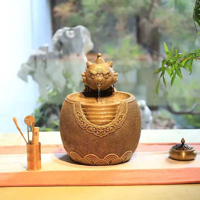 Golden ceramic decorbites chinese style wealth attracting fountain with lion-head spout and intricate wave floral patterns